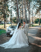 Stunning White Sweetheart Ball Gown Off-The-Shoulder Sleeveless Cathedral Train Ruffles Tulle Wedding Dresses